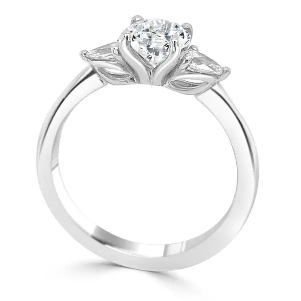 odette diamond trilogy engagement ring standing e1601469246755.jpg3